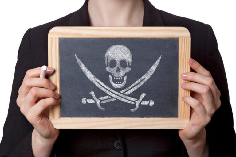 Woman holding pirate logo