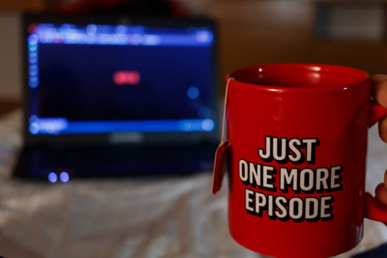 Netflix on PC and a mug