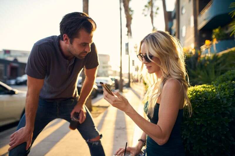 Man asking a woman something