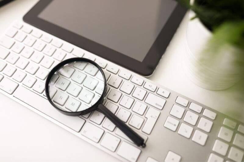 Magnifying glass on a keyboard